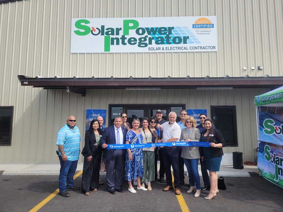 solar power integrator ribbon cutting