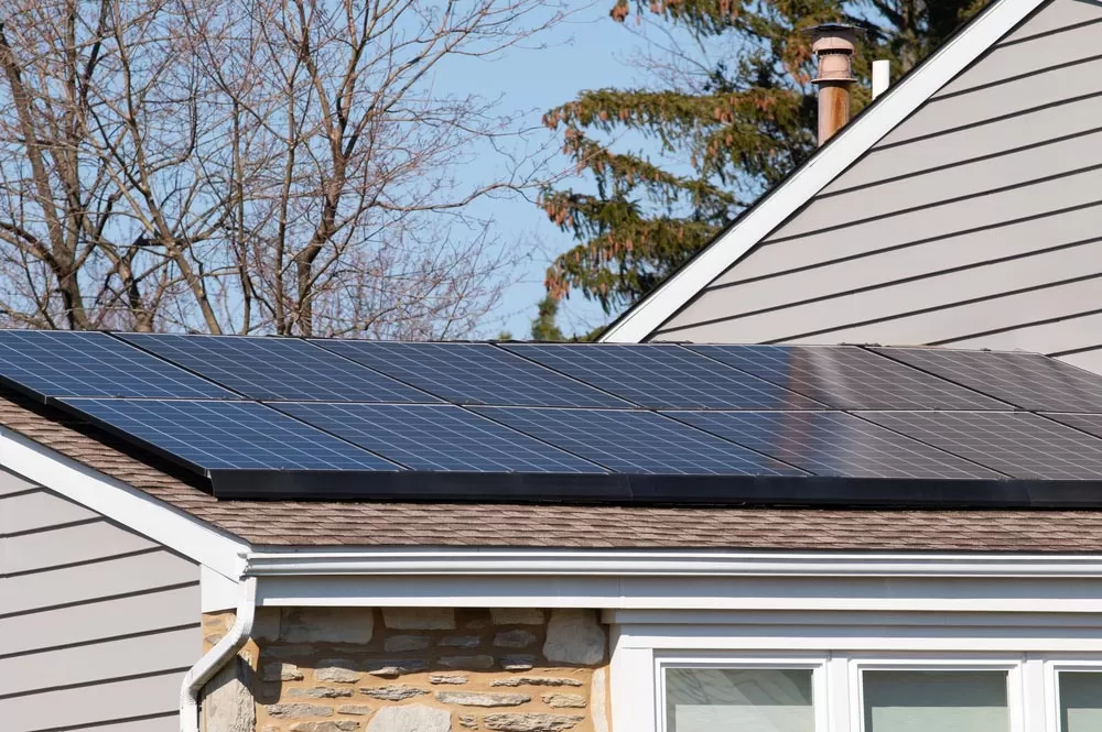 gutters and solar panels on home